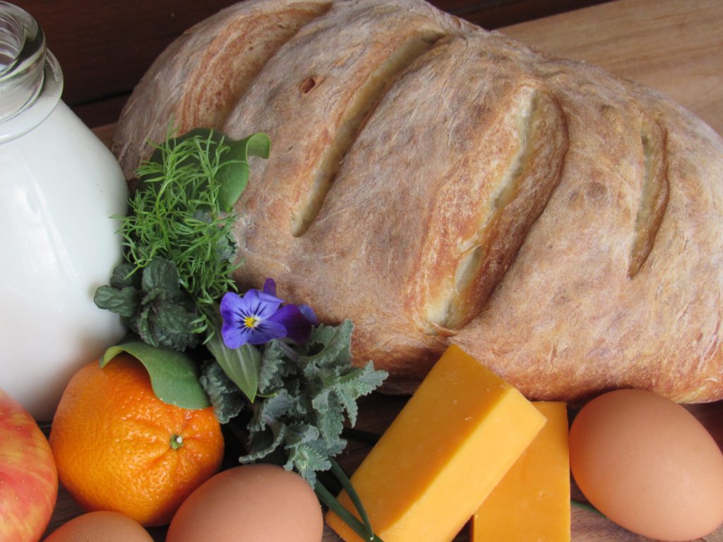 Image of Bread cheese and fruit for "Why you need to stop labeling food as good or bad" blog post