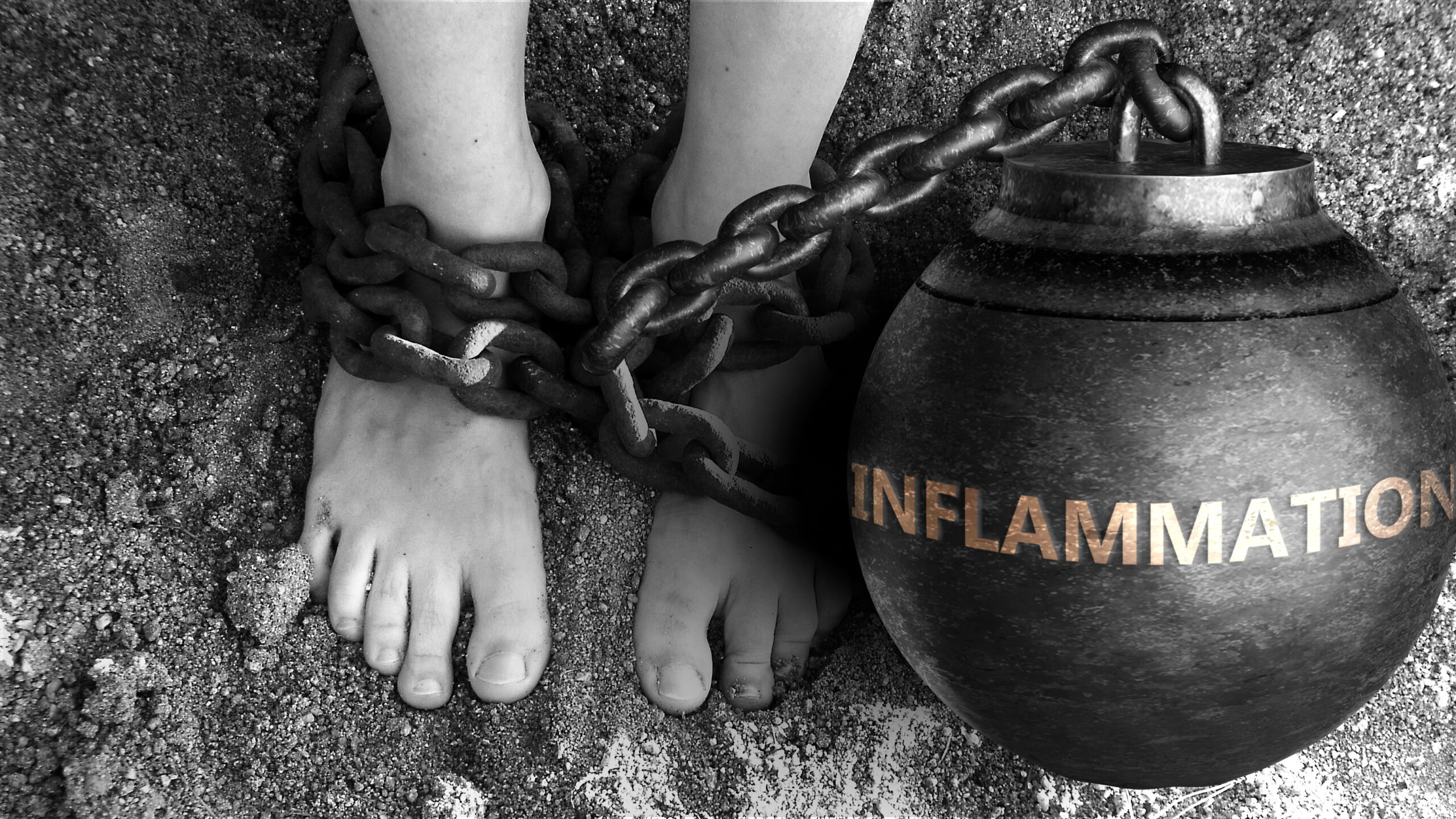 Inflammation Ball and Chain around womens feet.