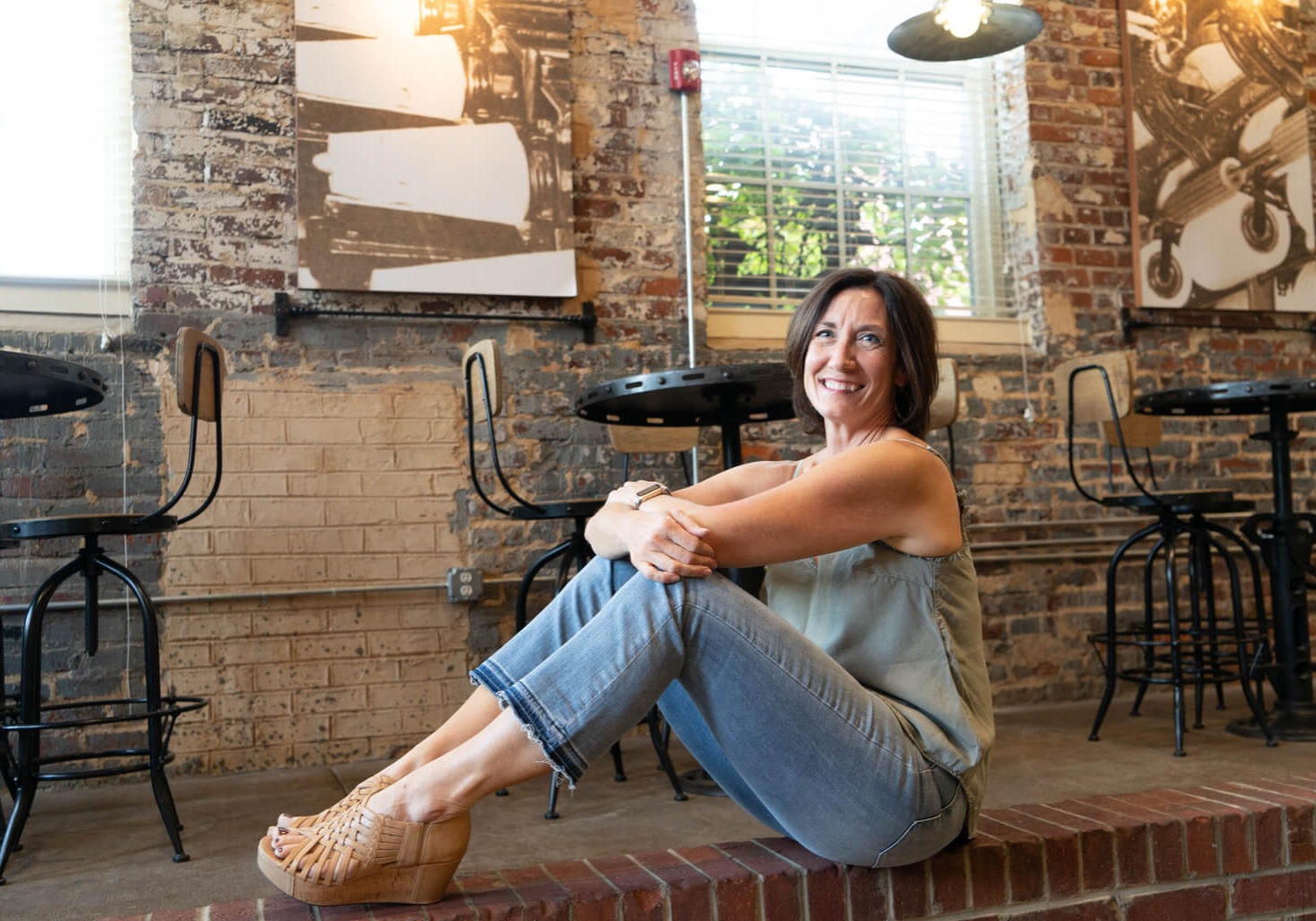 Ann Hackman sittin at a bar